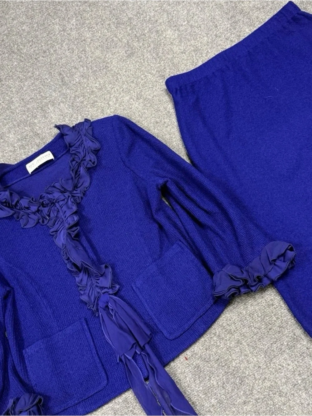 St. John Collection Blue knit skirt suit features a jacket Size 12
